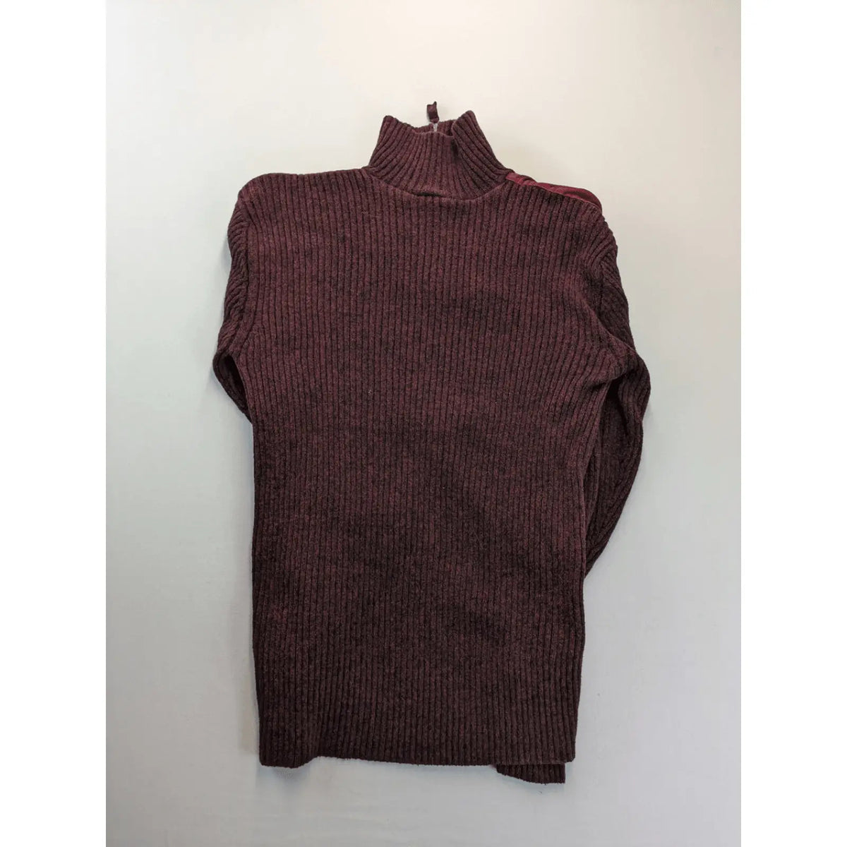 Infinity burgundy turtle neck jumper with quarter-zip and ribbed knit texture.