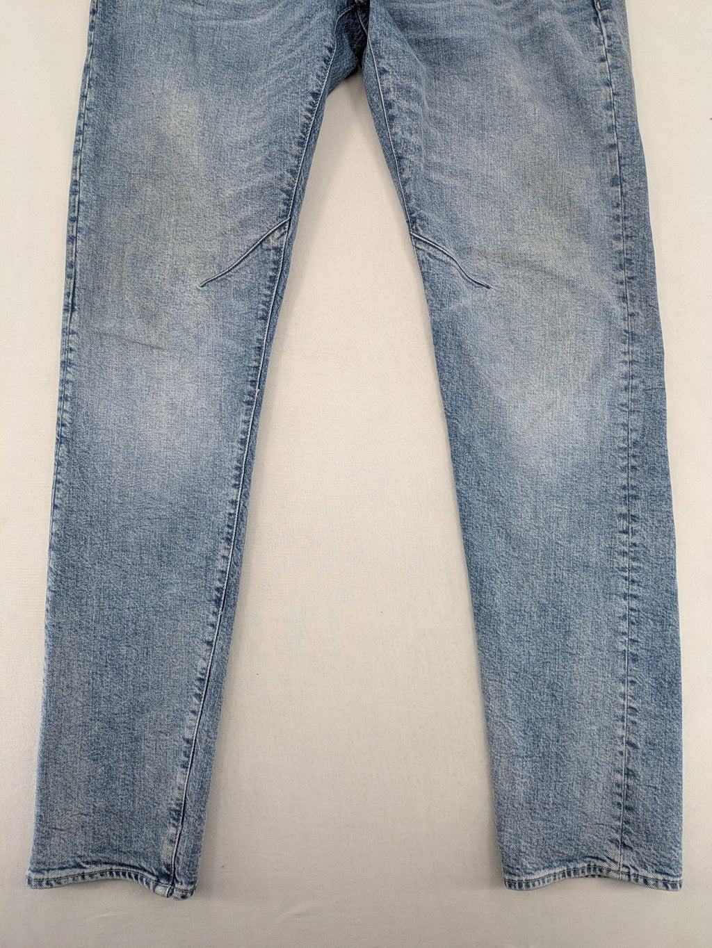G-Star Raw blue slim fit jeans with 5-pocket design and light wash denim.