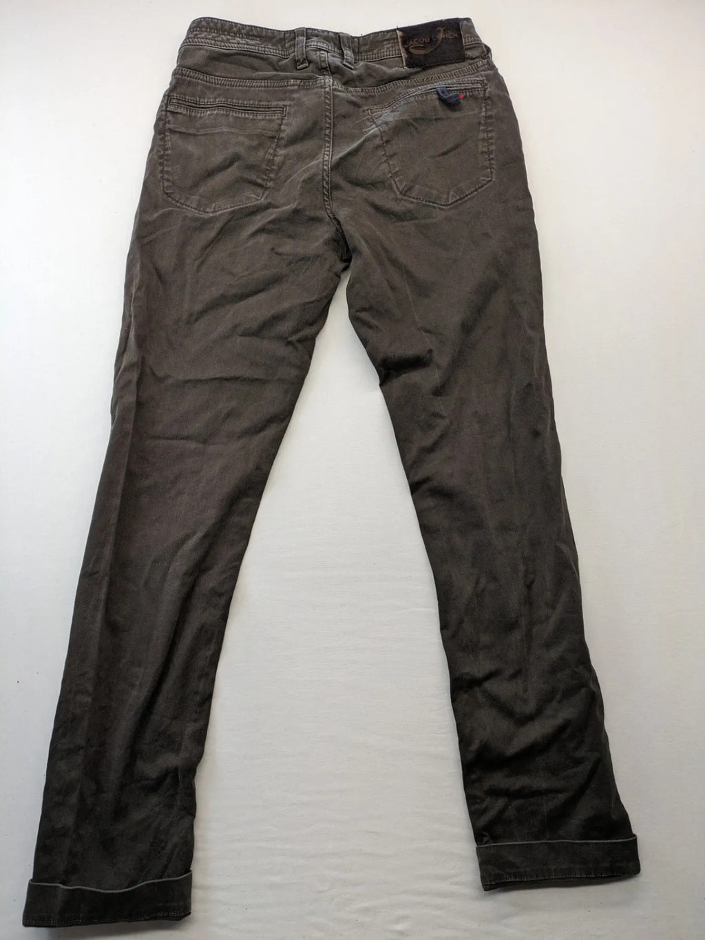 Jacob Cohen black straight jeans with leather logo patch and zip fly, size 32.