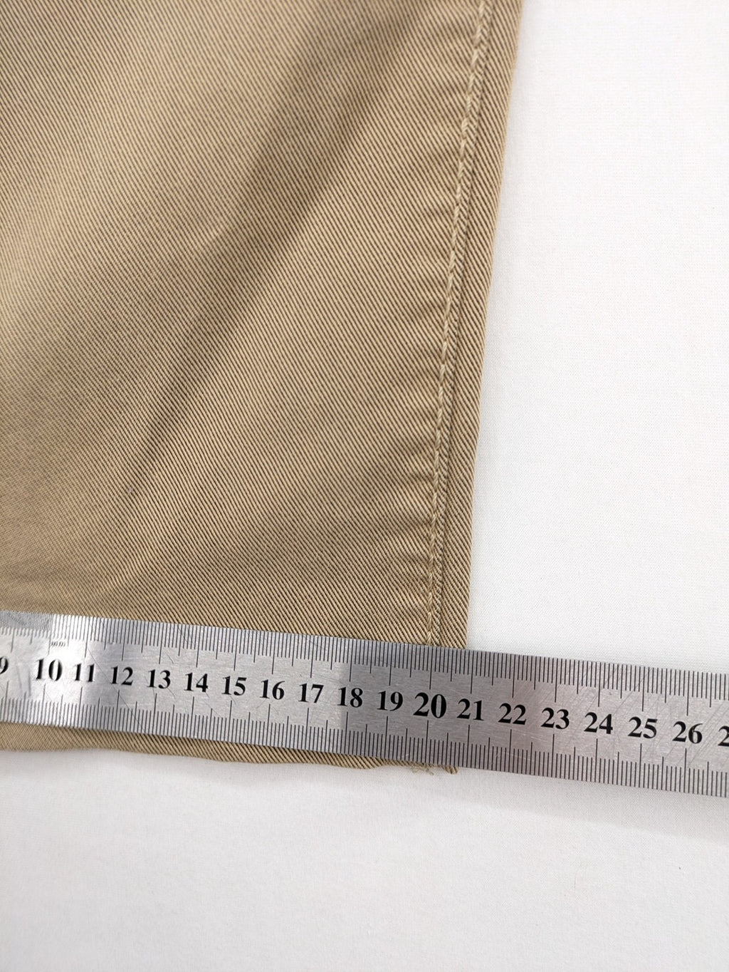 Joker beige straight jeans with double saddle stitching and classic 5-pocket design.
