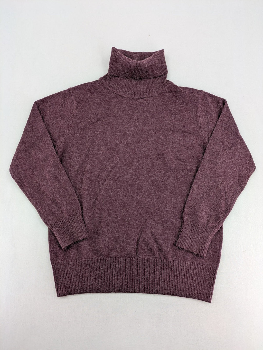 L.C.2 burgundy turtle neck jumper soft viscose blend with ribbed cuffs and hem.