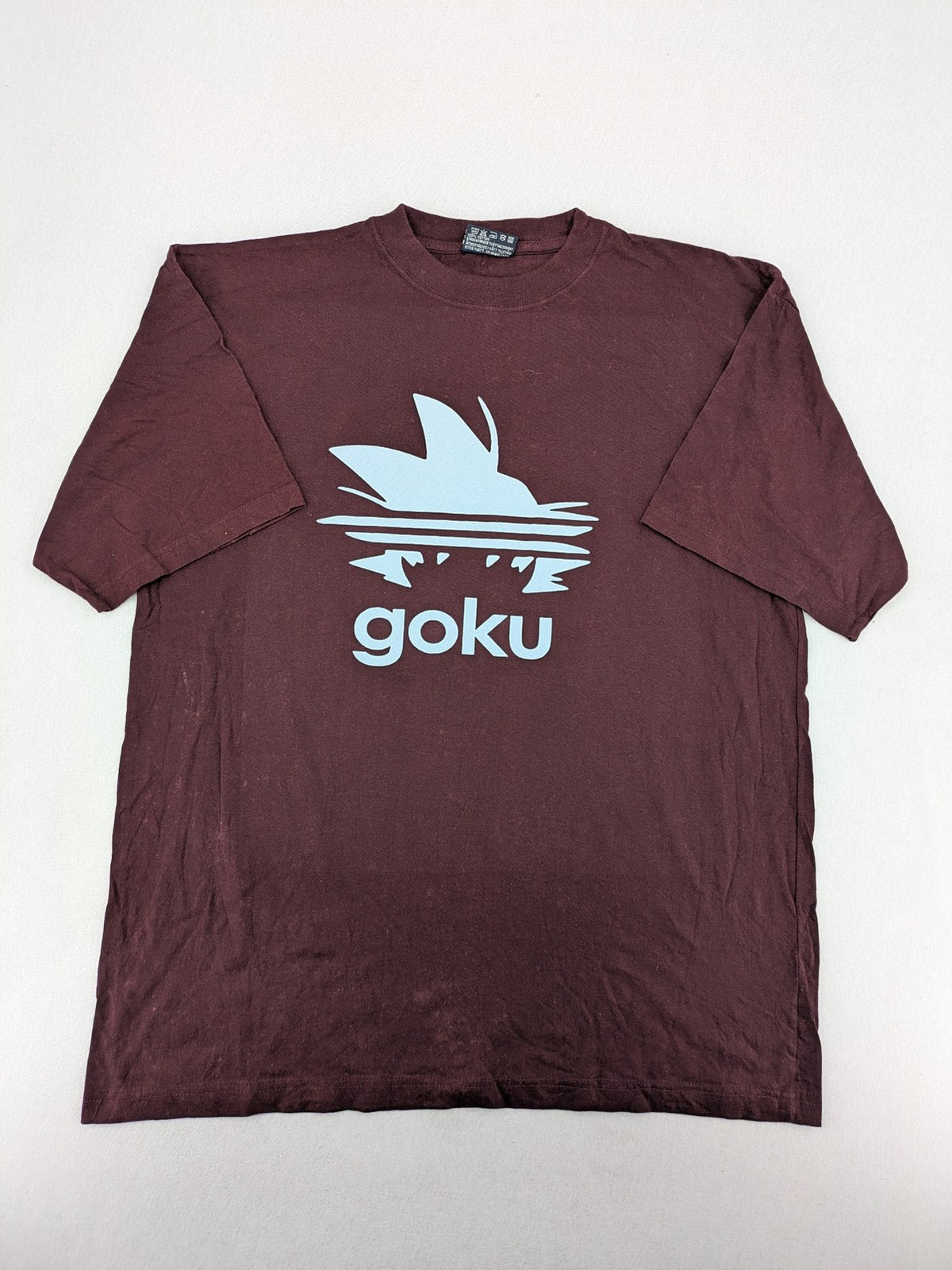ADI band t-shirt burgundy with blue graphic parody of Adidas logo and Goku silhouette