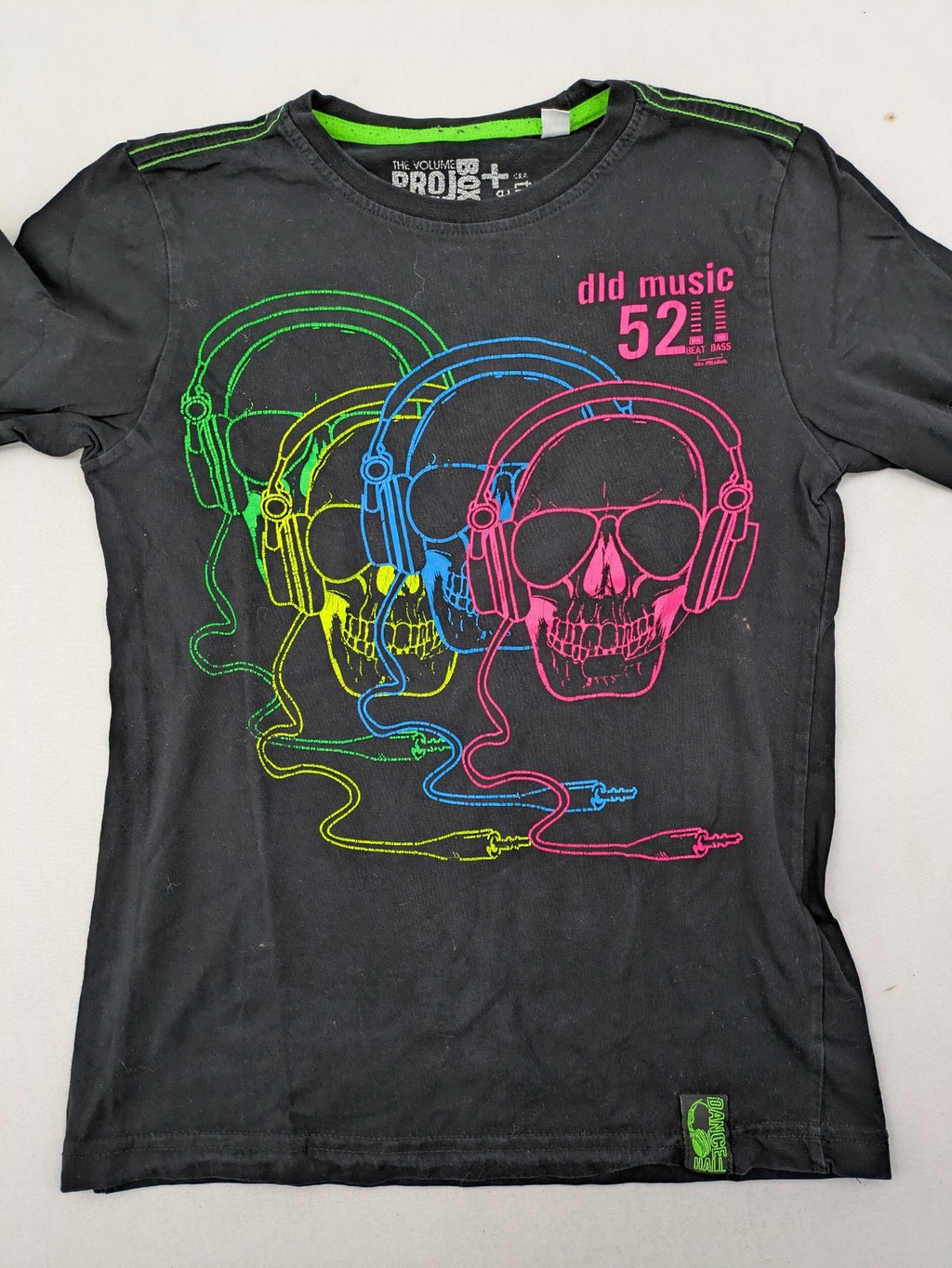 here there pink long sleeve shirt neon skull graphic with headphones and green contrast stitching