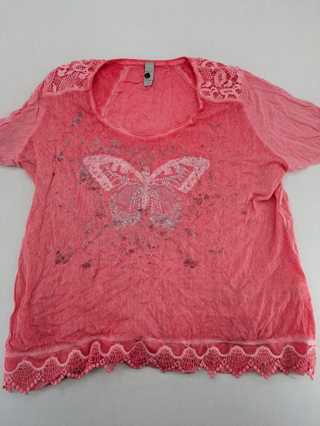 TREDY pink top with butterfly graphic, embellished with rhinestones and lace accents.