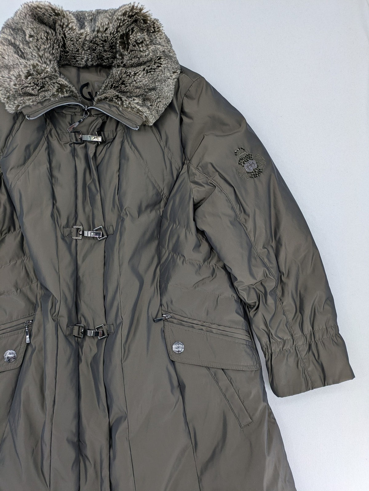 Gerry Weber Edition grey quilted coat with faux fur collar and metal toggle closures.