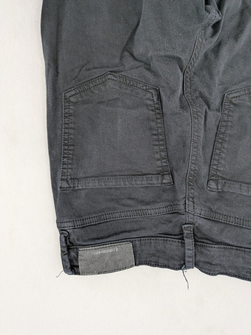 Stradivarius black skinny jeans high waist raw hem five-pocket style