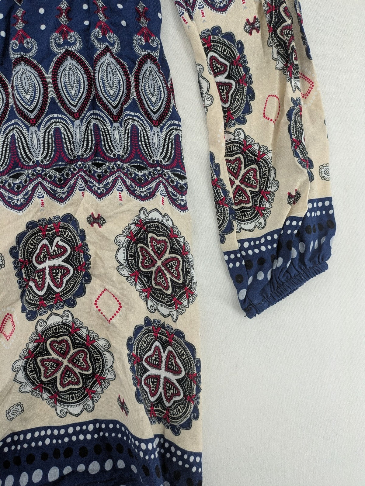 Uğurlar Collection multi tunic dress with vibrant Boho-Ethno pattern and V-neck tassel detail.