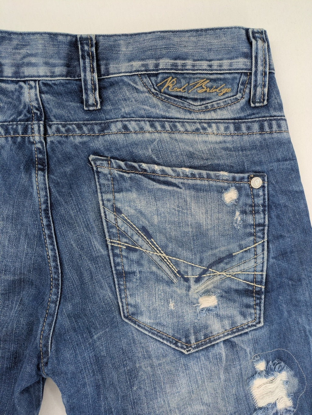 Red Bridge blue straight jeans distressed ripped design button fly five-pocket style