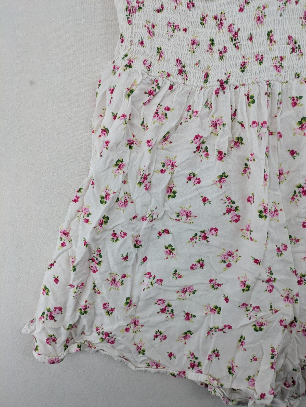 FB Sister floral playsuit white with pink flowers, smocked bodice, lightweight viscose material.