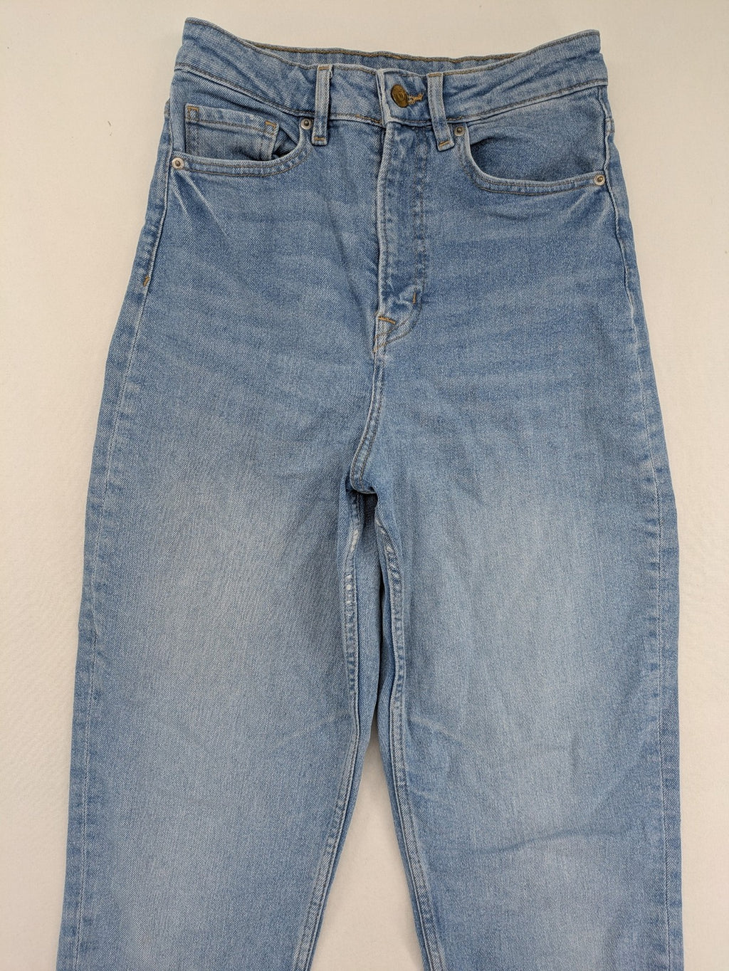H&M Divided blue mom jeans high waist tapered fit with classic wash and durable cotton blend.
