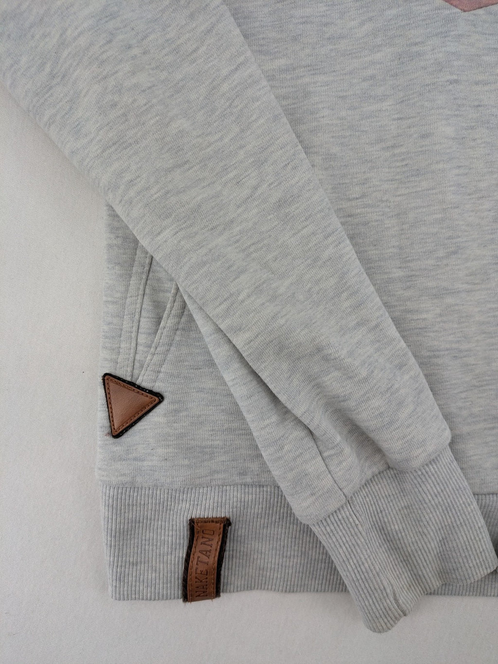Naketano multi turtle neck jumper colorblock design in blue, pink, and grey.