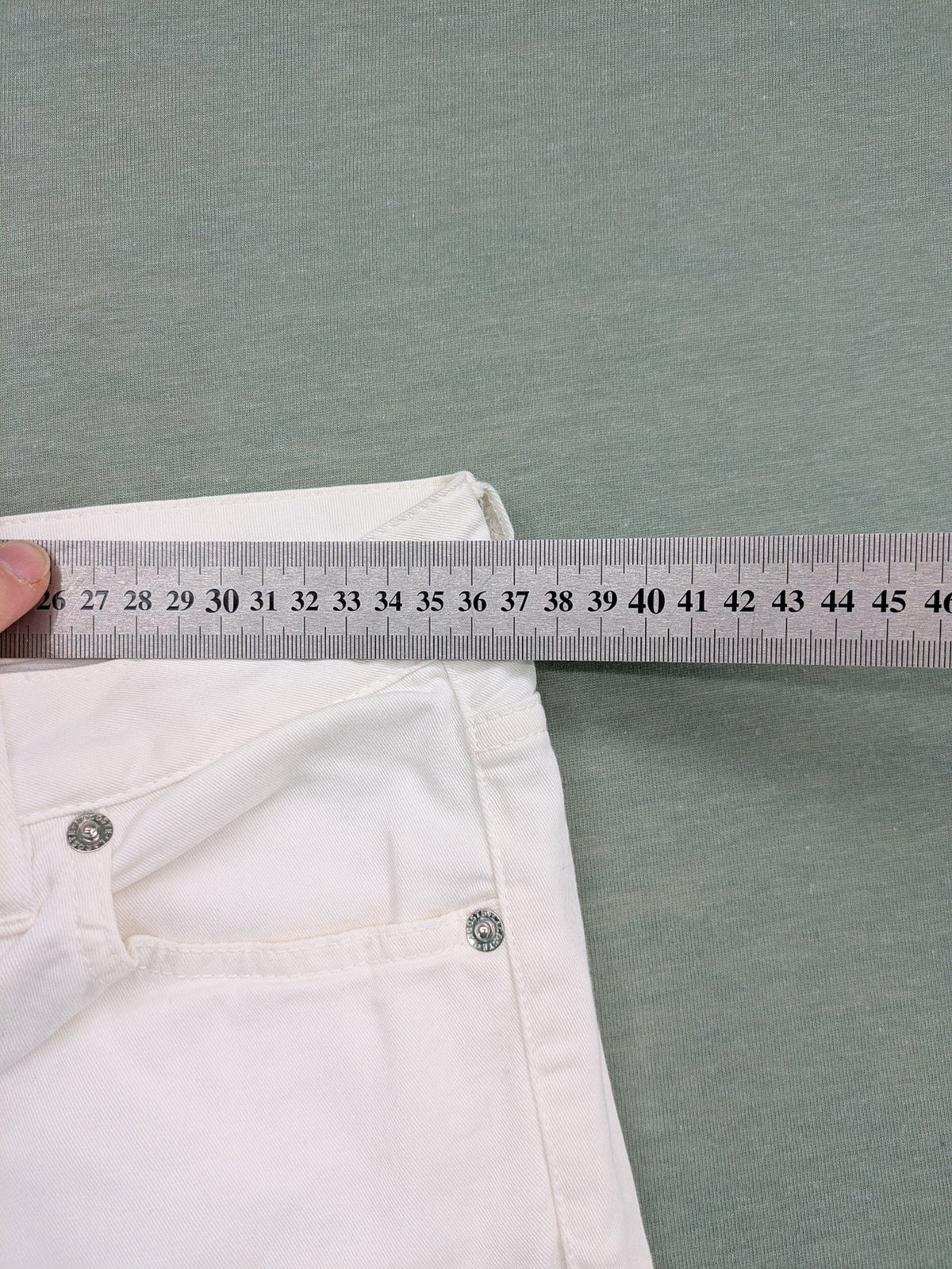Lacoste white straight jeans high rise slim fit with logo and stretch denim material.