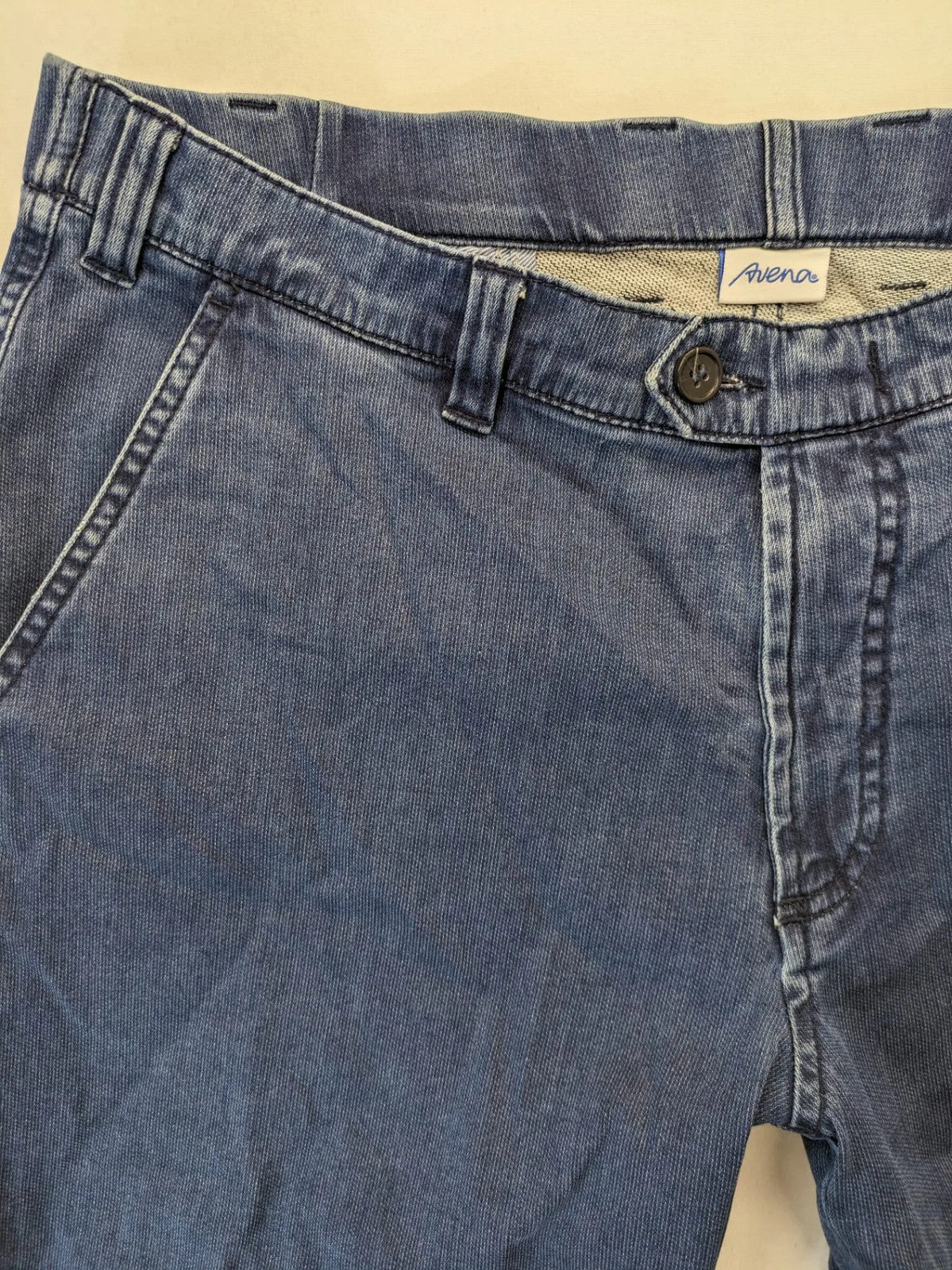 Avena blue chino pants, straight leg, cotton blend, featuring zipper and buttoned pockets.