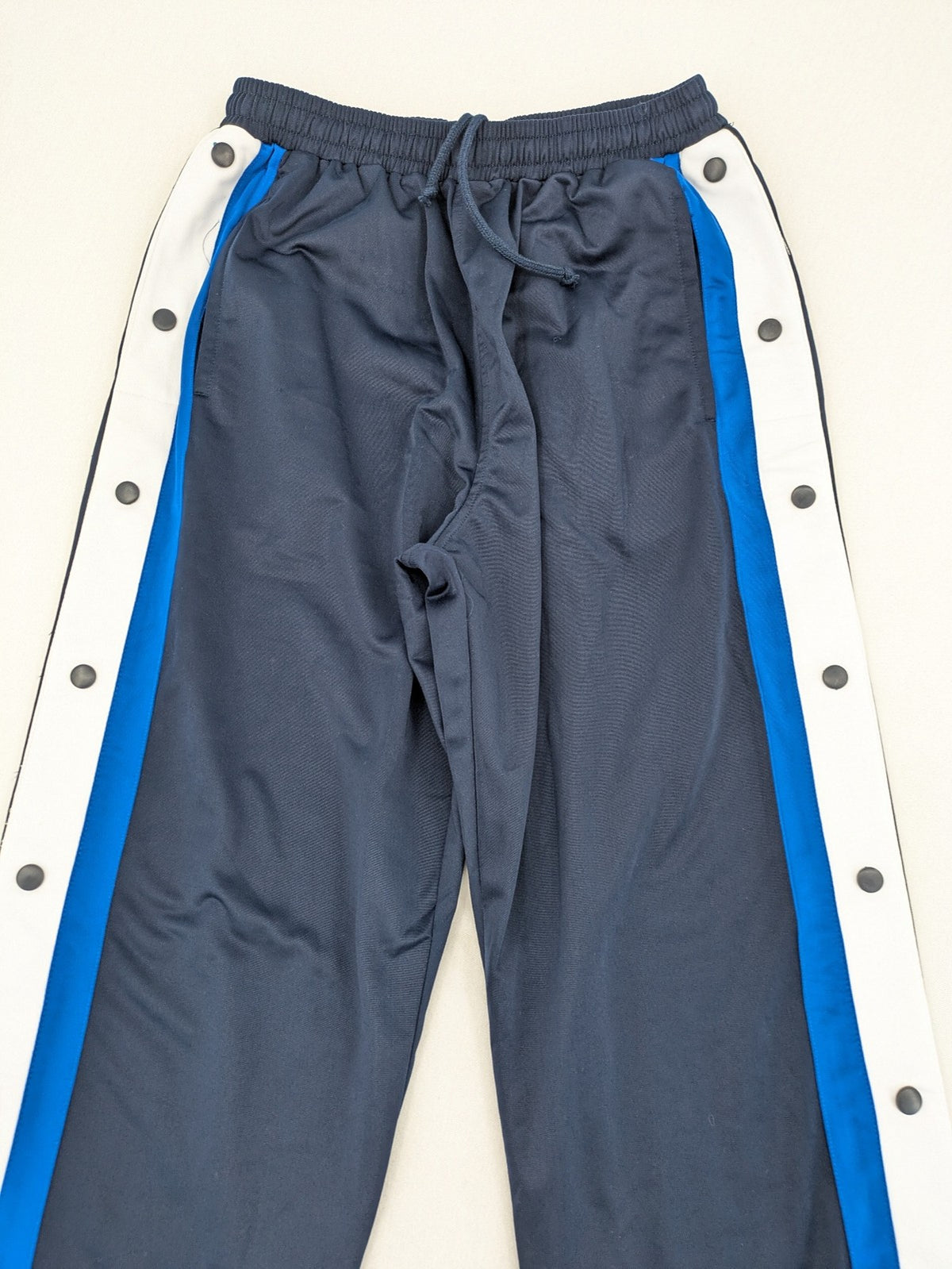McORVIS blue tearaway training pants with side snap buttons and elastic waistband.