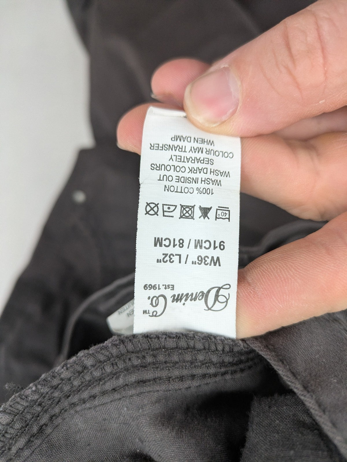 Denim & Co. grey chino pants cotton workwear with button fly and pocket rivets.