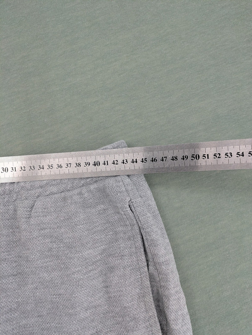Livergy grey sweat shorts with elastic waistband, drawstring, and side pockets.
