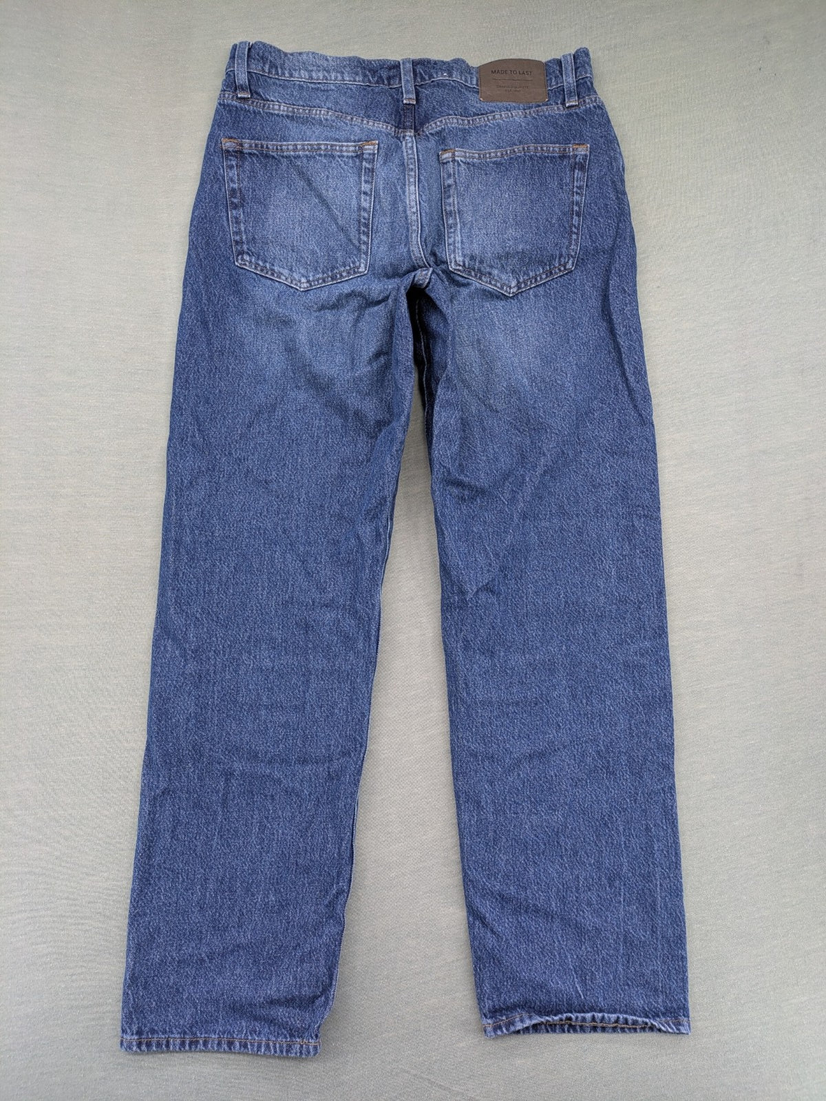 C&A blue straight jeans relaxed fit with traditional button fly and 5-pocket design.