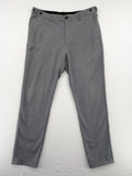 Zara pink pants with button and zipper closure, featuring side pockets and elegant design.