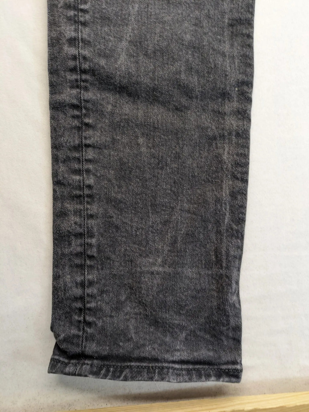 COS grey straight jeans with classic 5-pocket style and washed denim texture.
