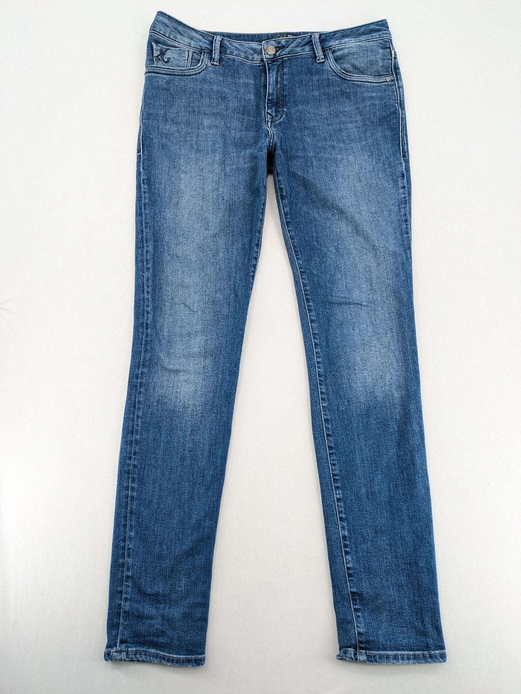 Mavi blue straight leg jeans with classic 5-pocket styling and medium wash.