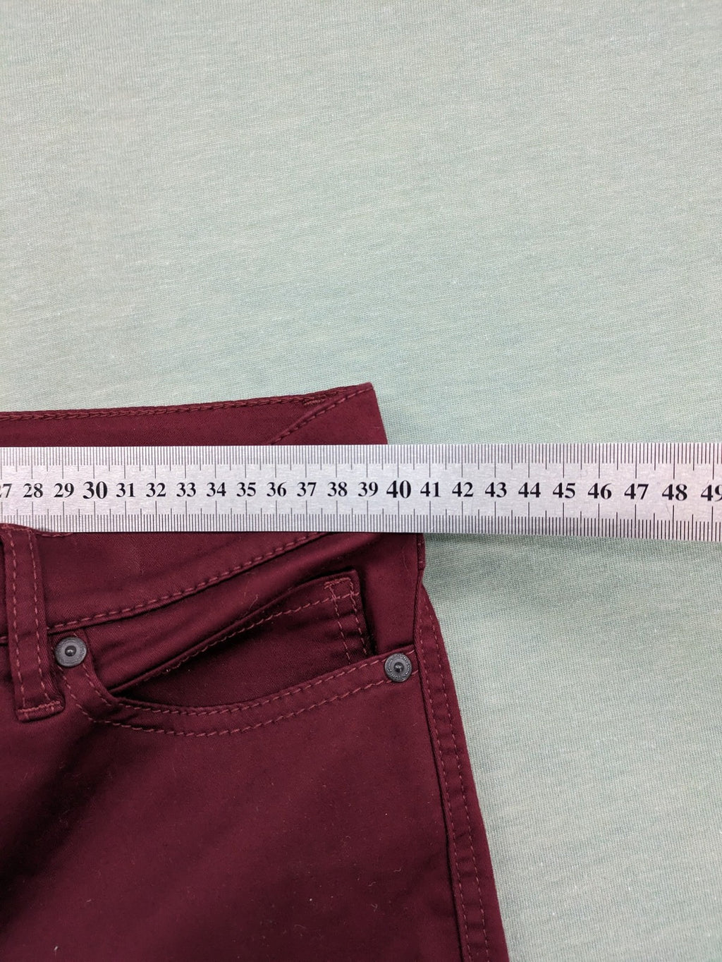 TONI burgundy straight jeans CS-Slim-Fit with subtle rhinestone detail on pocket.