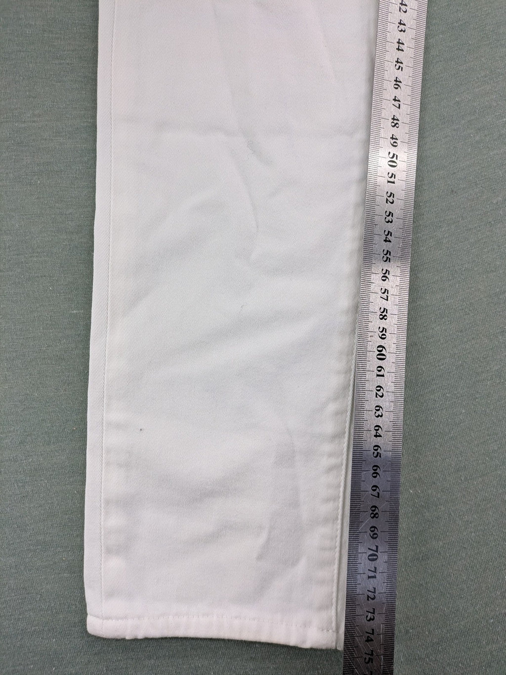 Lacoste white straight jeans high rise slim fit with logo and stretch denim material.