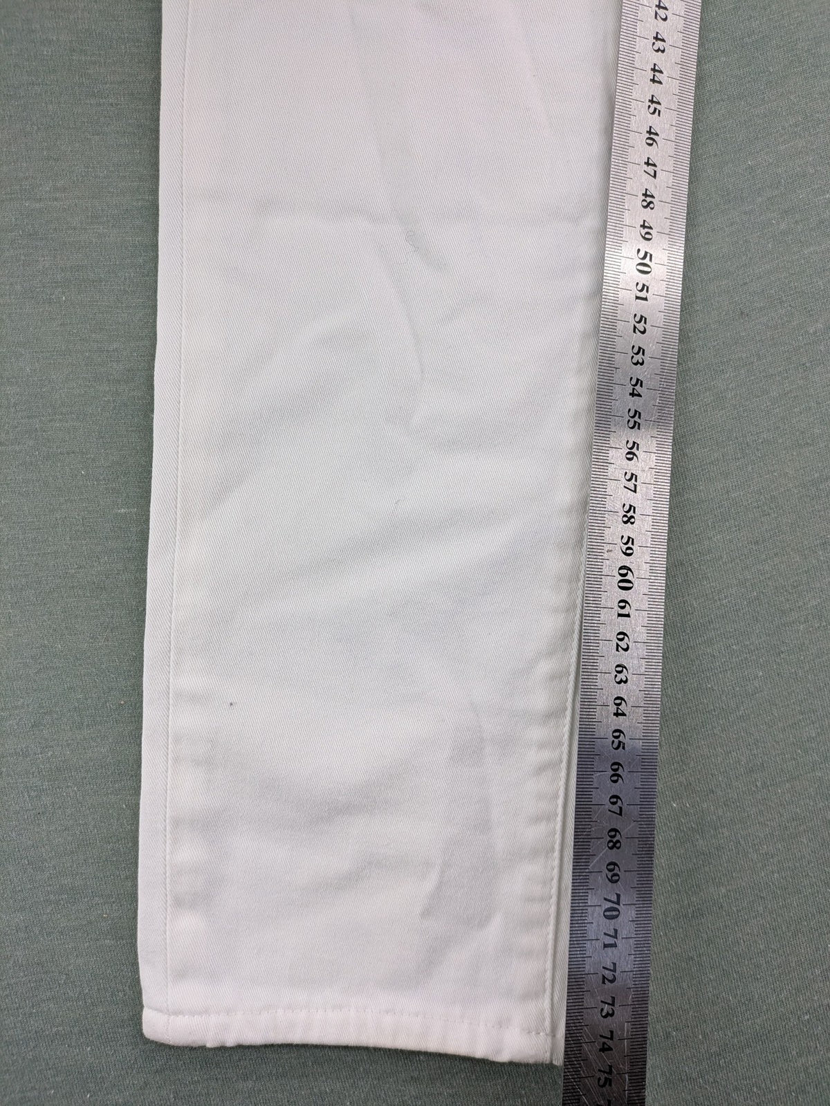 Lacoste white straight jeans high rise slim fit with logo and stretch denim material.