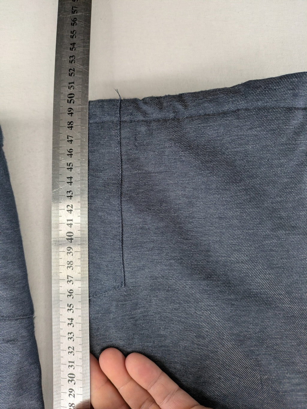Topolino grey snow pants with adjustable straps and durable insulated material.