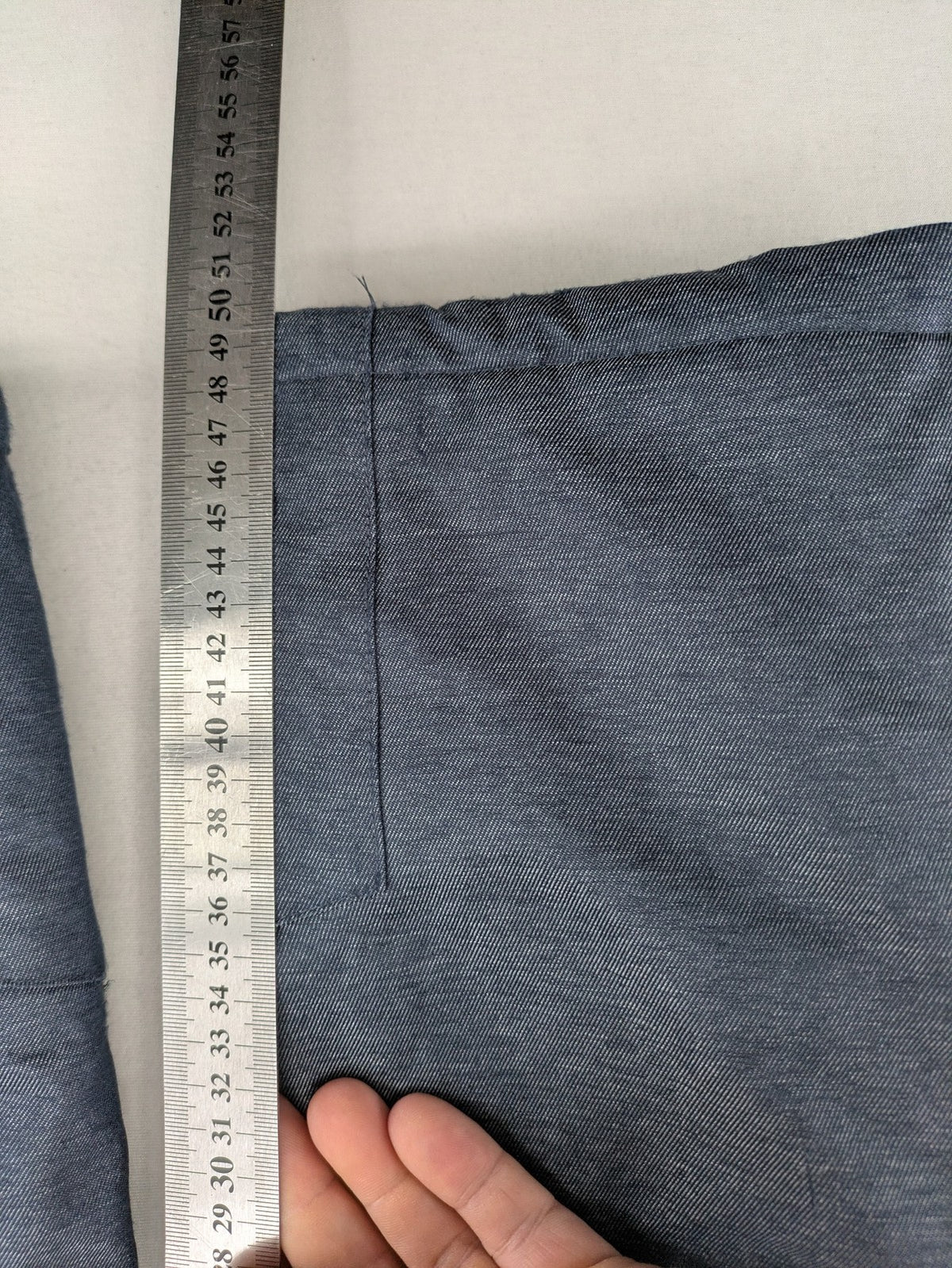 Topolino grey snow pants with adjustable straps and durable insulated material.