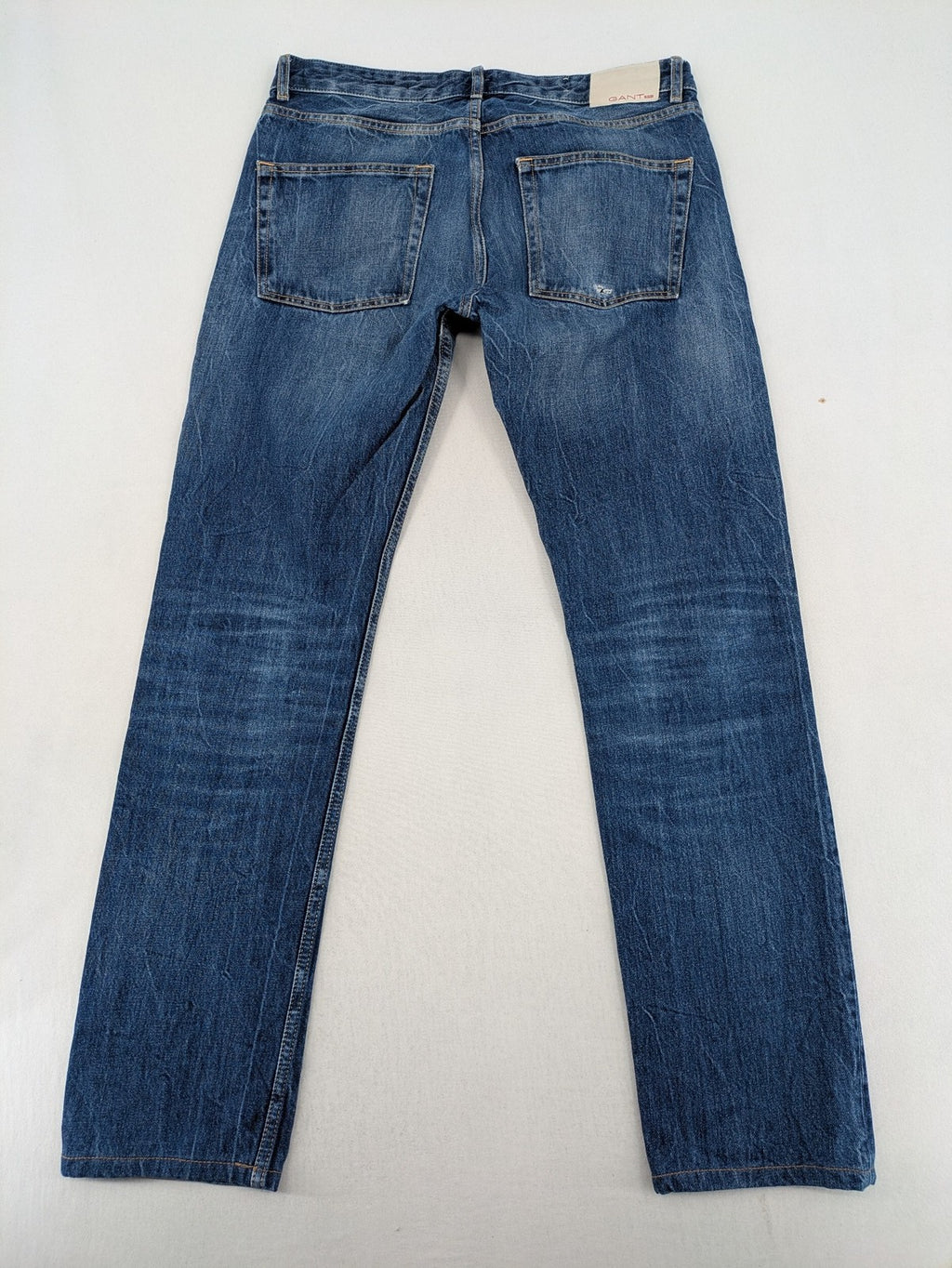 GANT Rugger blue straight leg jeans medium wash, classic button fly, durable cotton denim.