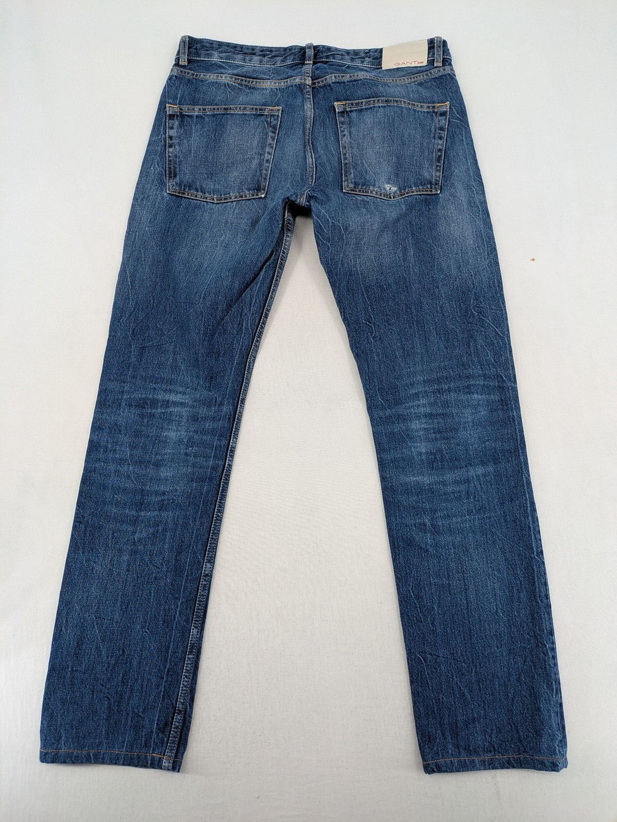 GANT Rugger blue straight leg jeans medium wash, classic button fly, durable cotton denim.