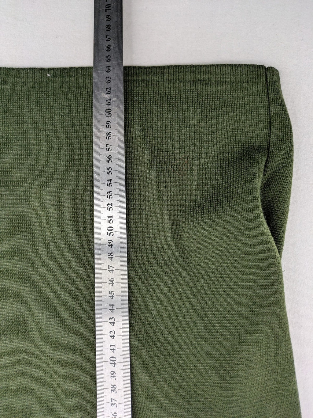 LUCIA green Trachtenjacke with embroidered crest, quilted collar, and decorative buttons.