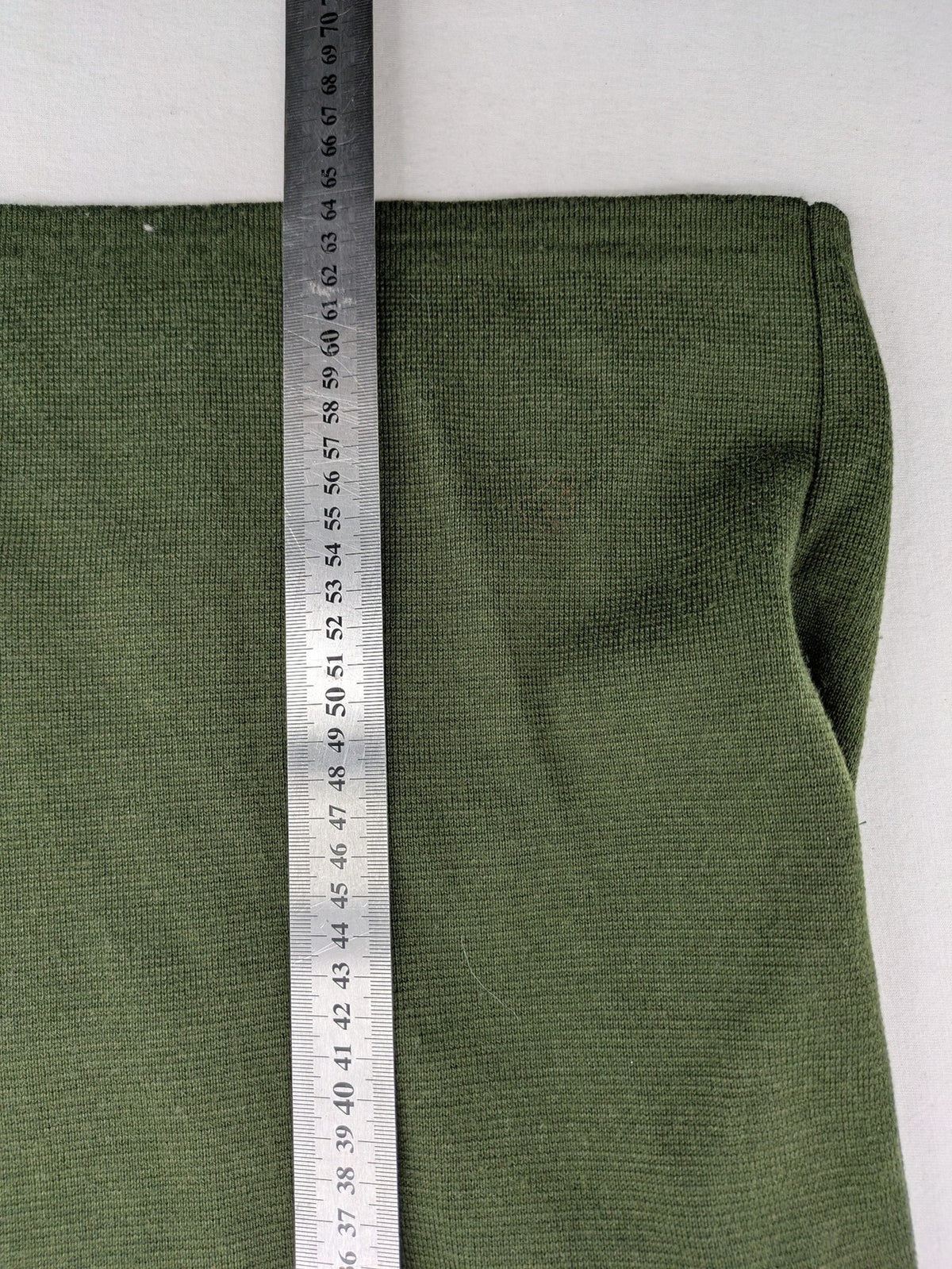 LUCIA green Trachtenjacke with embroidered crest, quilted collar, and decorative buttons.