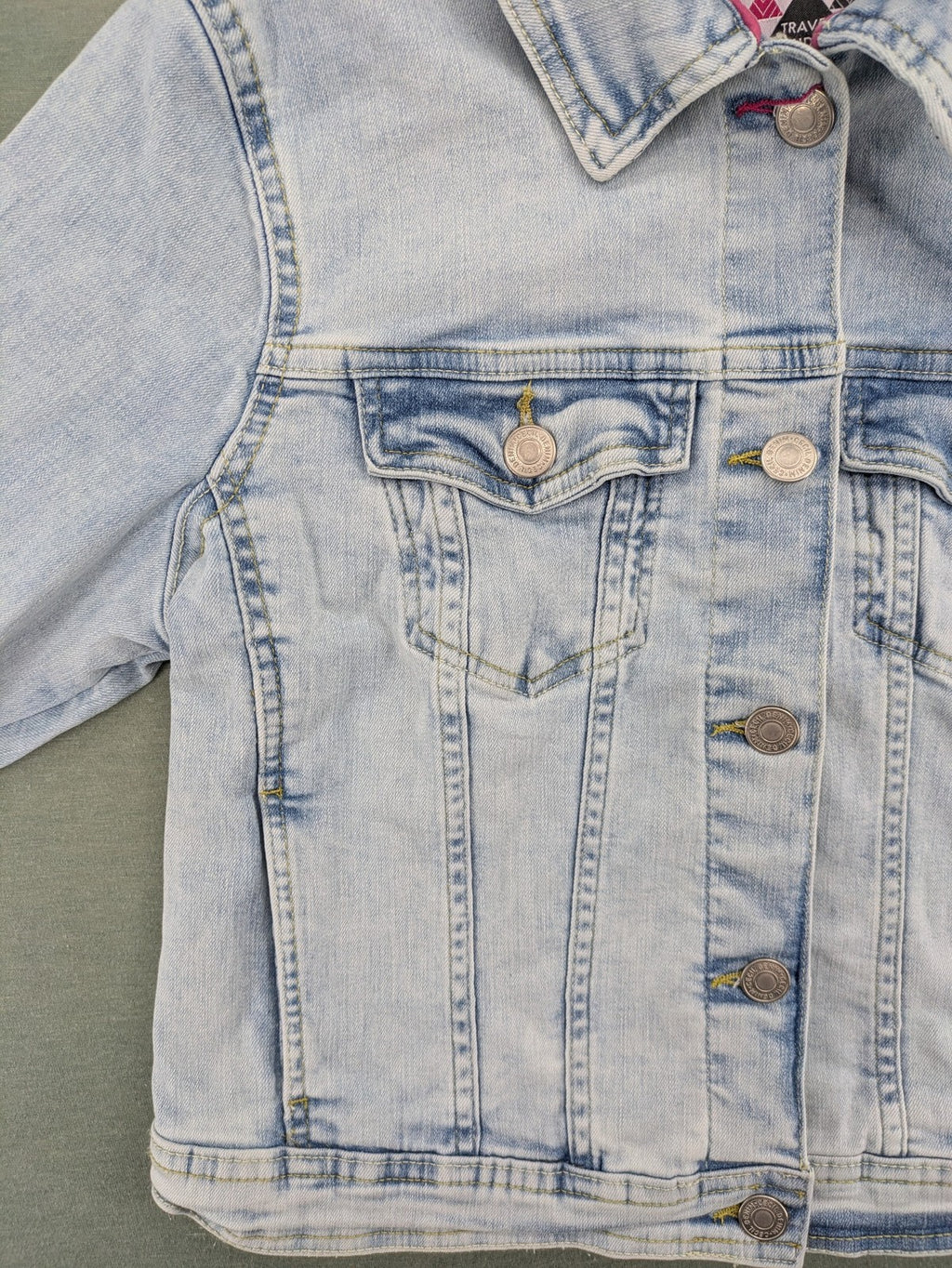 hle blue denim jacket lightwash classic trucker style with pink collar trim and pockets