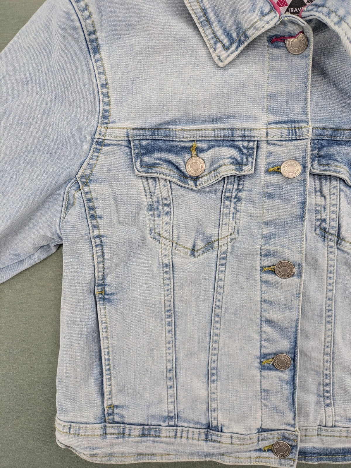 hle blue denim jacket lightwash classic trucker style with pink collar trim and pockets