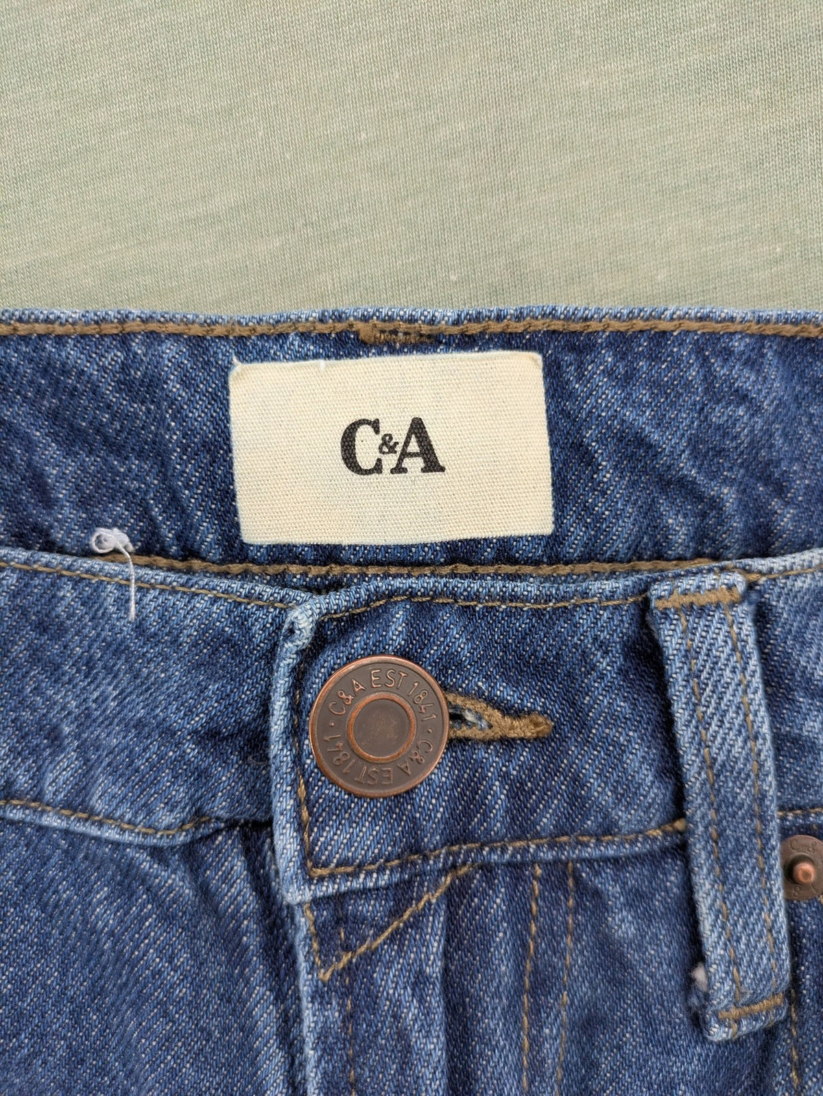C&A blue straight jeans relaxed fit with traditional button fly and 5-pocket design.