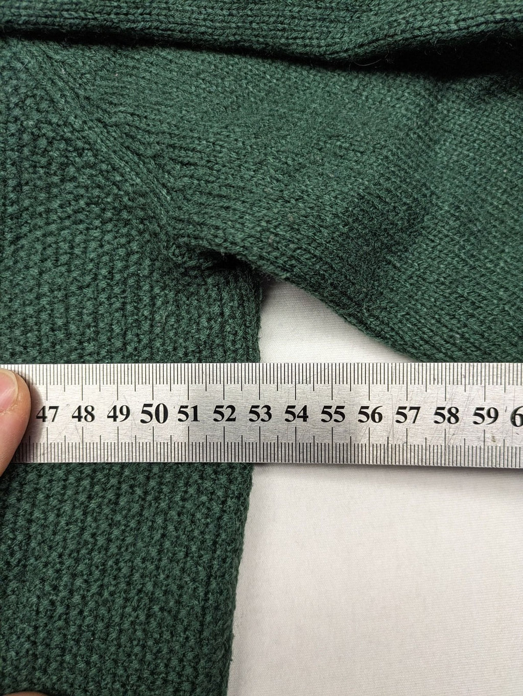 Broken Standard turtle neck jumper green waffle knit texture with classic round neckline.