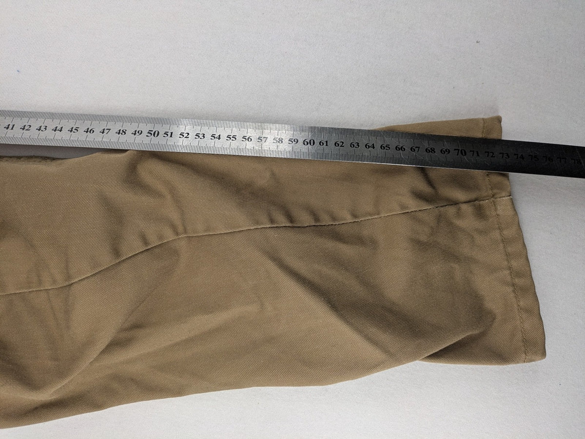 Crosshatch grey cargo pants with multiple pockets and durable cotton-polyester blend.