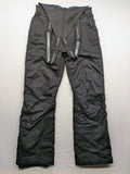 Schoffel black ski pants with adjustable straps, zip pockets, and snow gaiters.