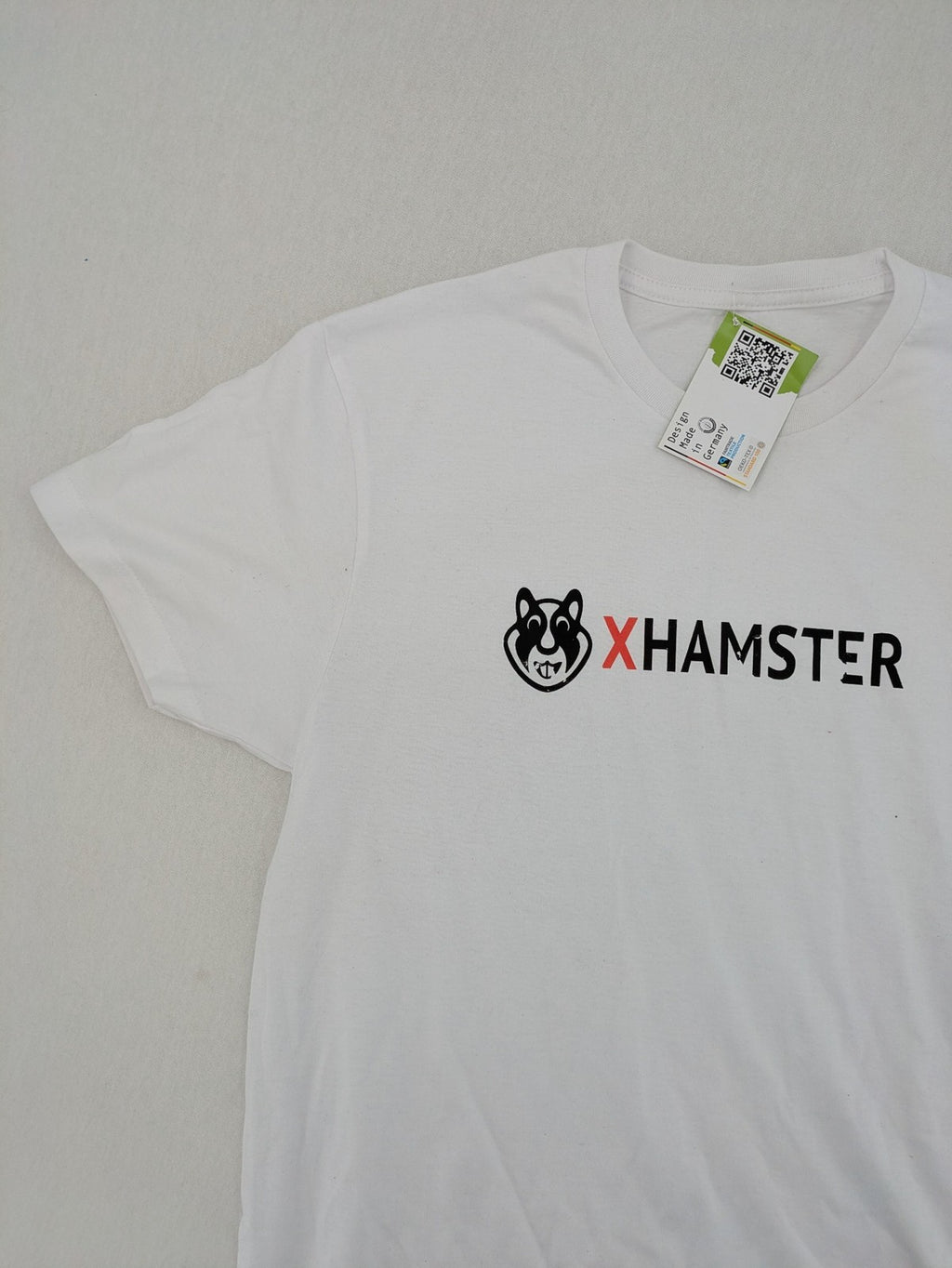 Xhamster white graphic t-shirt printed logo on chest, short sleeves, round neck.