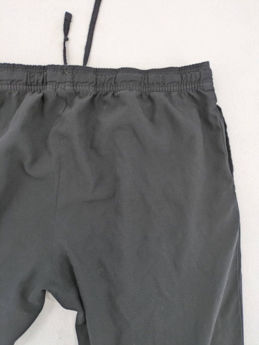 Slazenger grey loungewear joggers with adjustable drawstring and subtle logo on thigh.