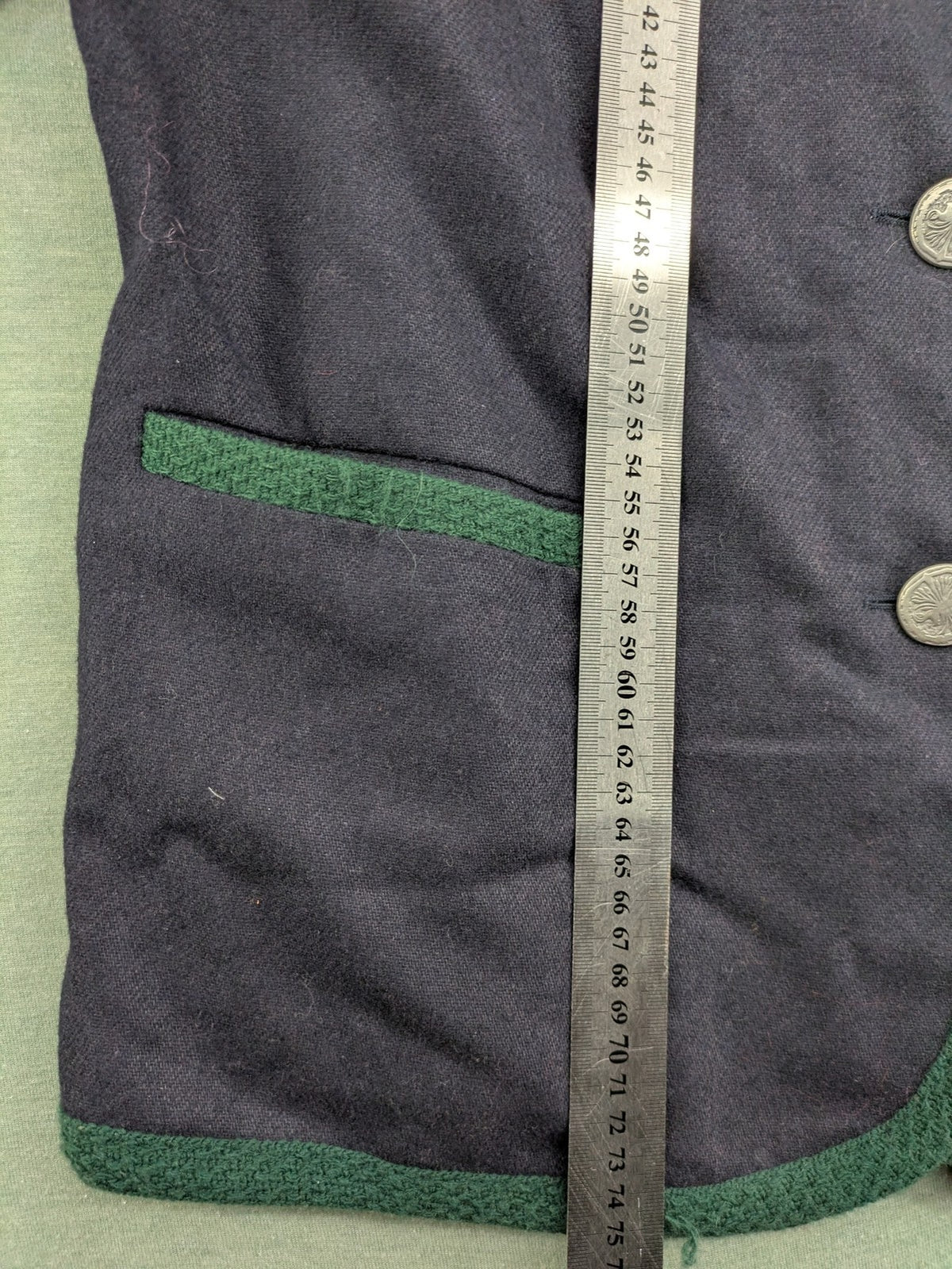 Blazer green and navy jacket with embroidered details and silver buttons.