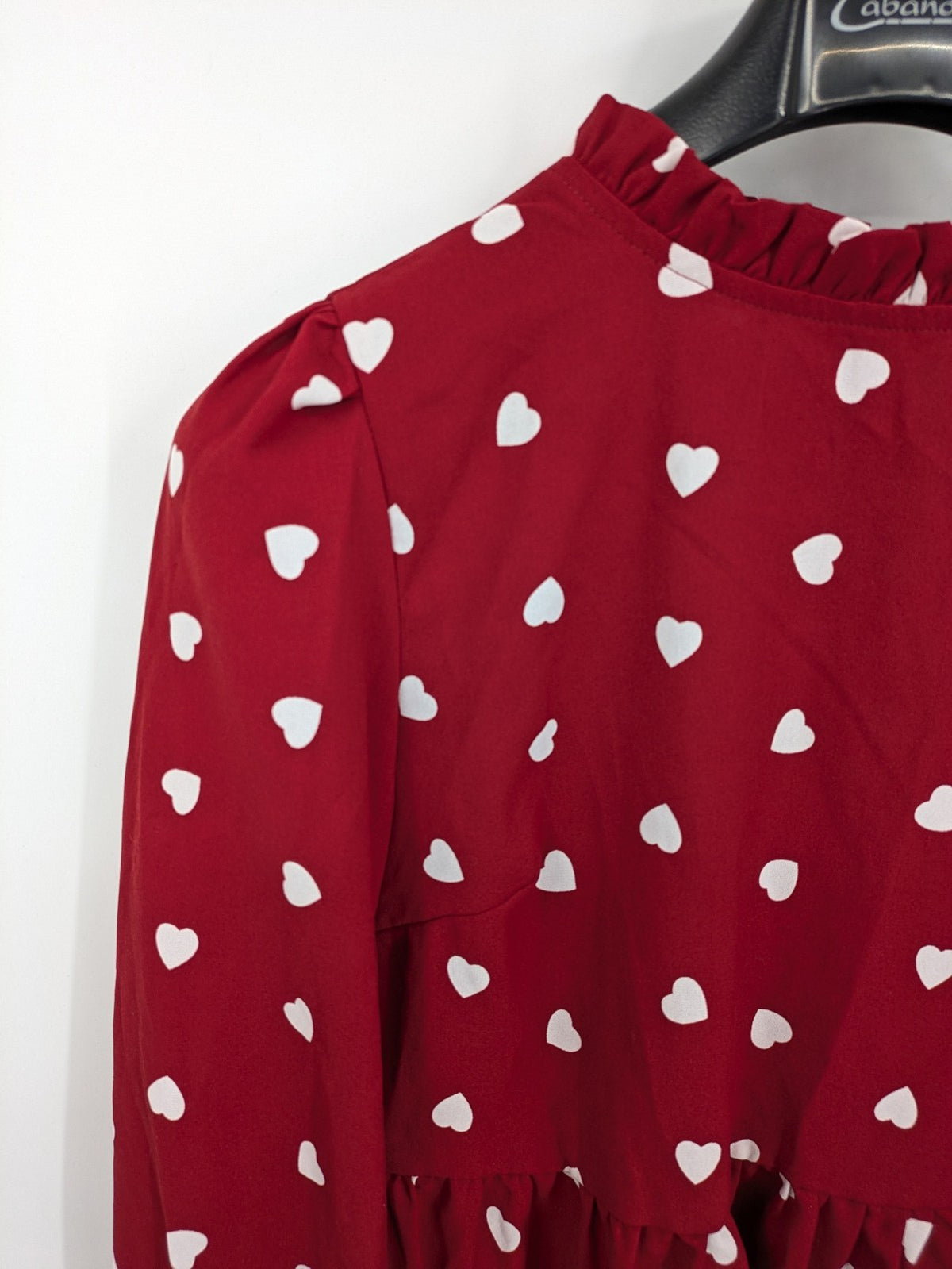 SHEIN burgundy top with white heart pattern and ruffled neckline detail.