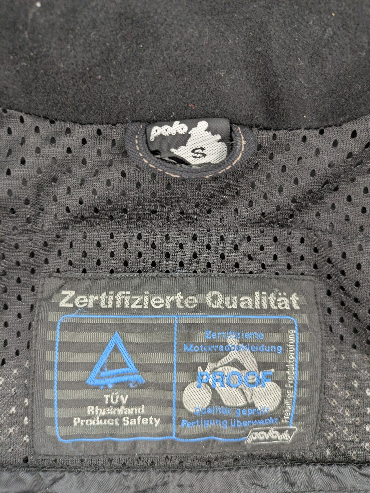 Polo multi biker jacket nylon with adjustable fit and multiple pockets.