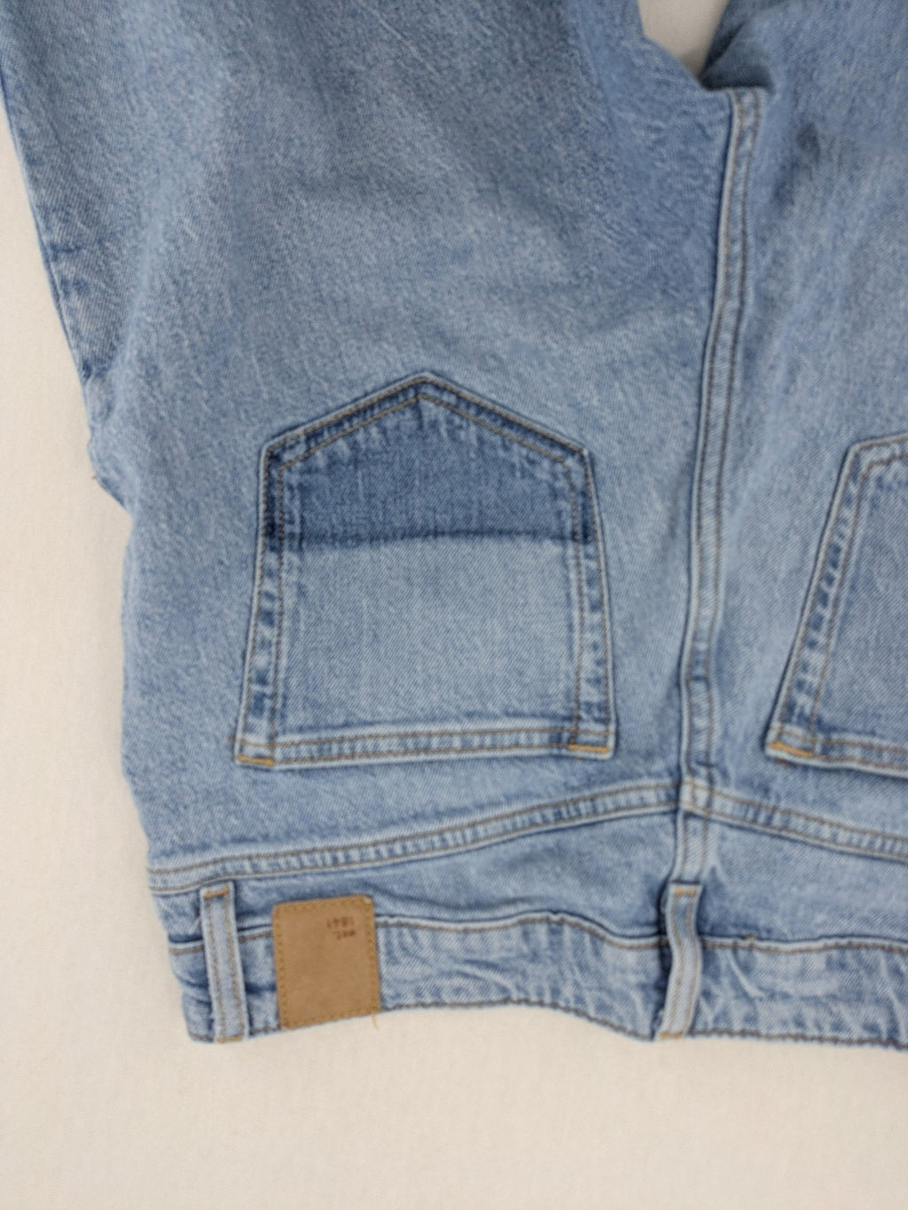 C&A blue mom jeans high waist with unique patchwork design and soft stretch denim.
