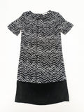 Tom Tailor black and white patterned dress with short sleeves and zigzag design.