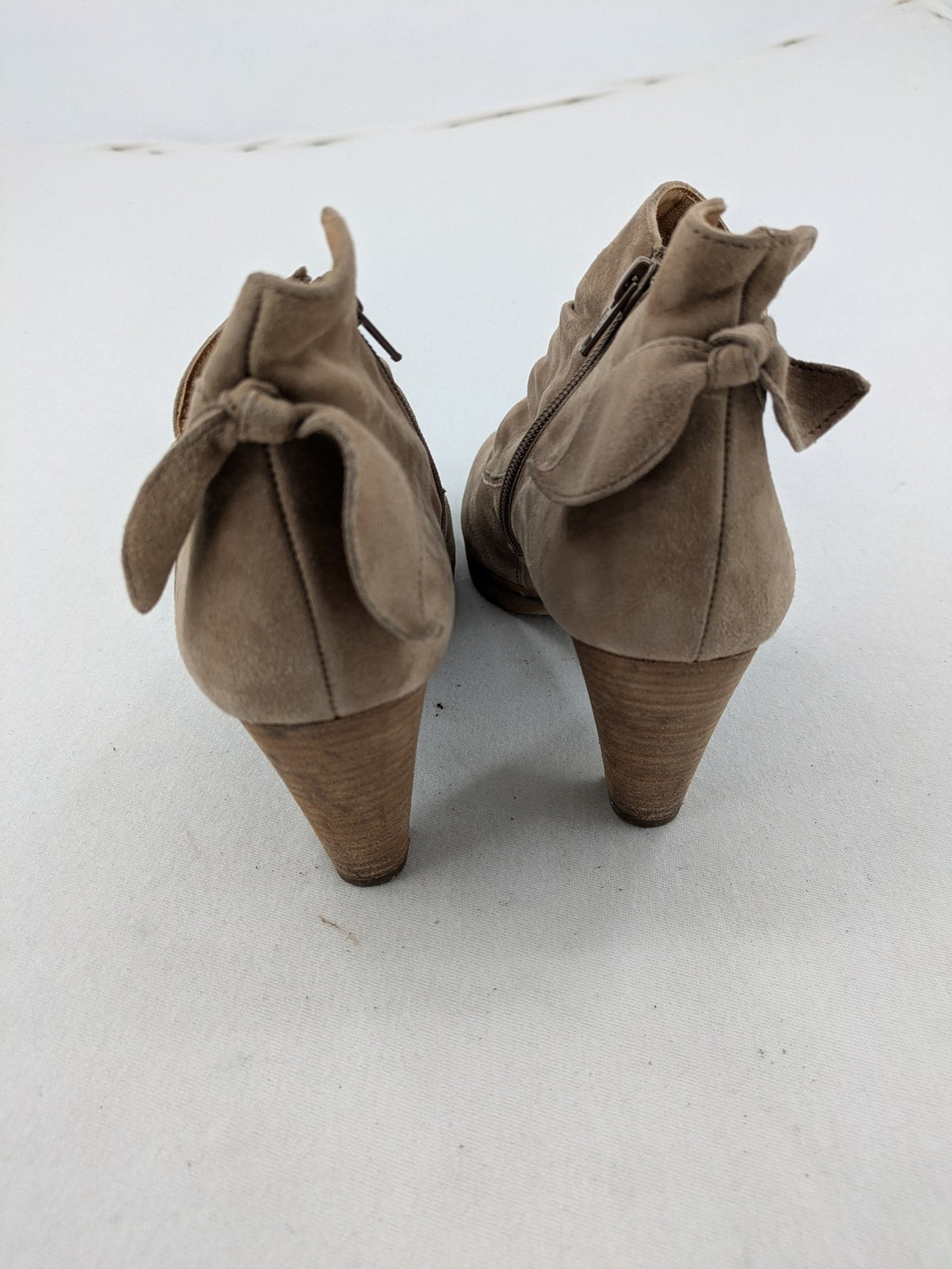 Paul Green taupe suede ankle boots with gathered front, peep toe, and block heel.