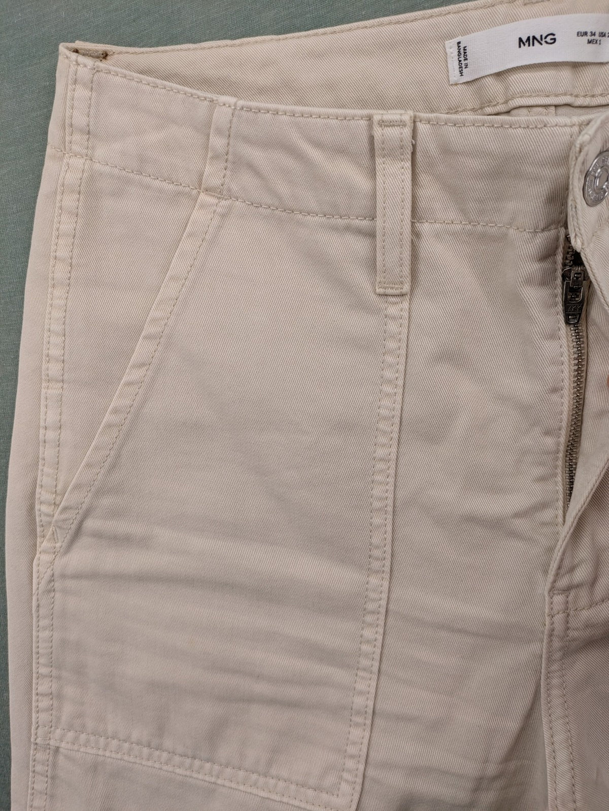 MNG beige cargo pants with straight leg, button closure, and patch pockets.