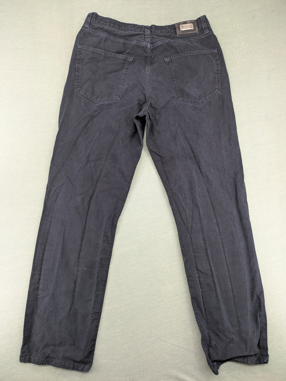 BOSS Hugo Boss grey straight jeans classic 5-pocket design with leather patch.