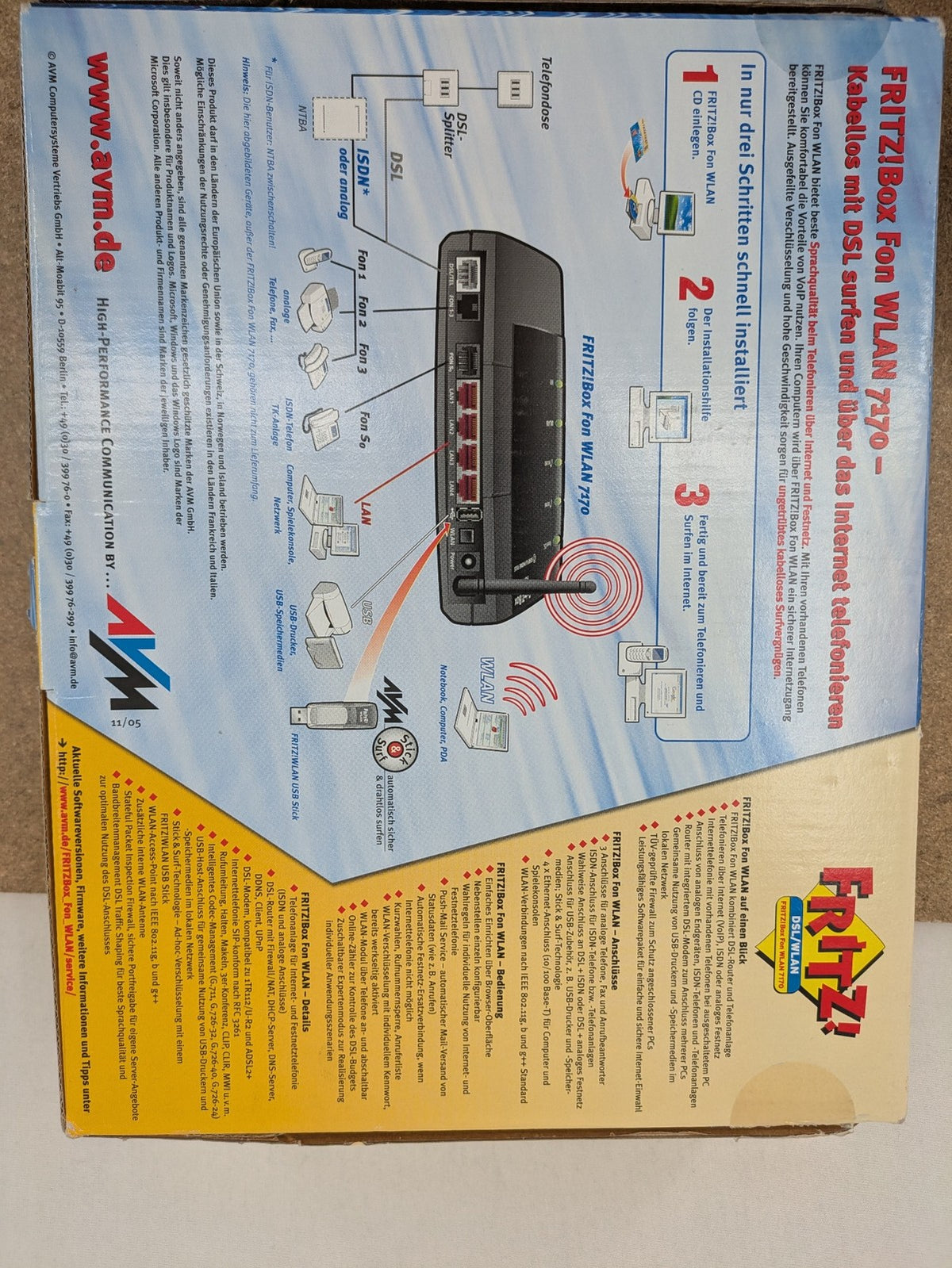 AVM wireless router black grey yellow with logo and integrated DSL modem features.